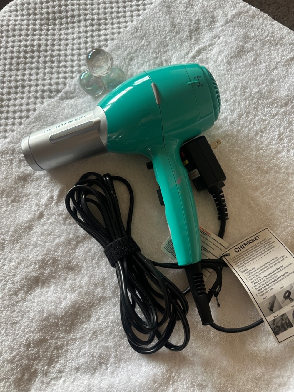 Turquoise Handheld Hair Dryer with Silver Barrel